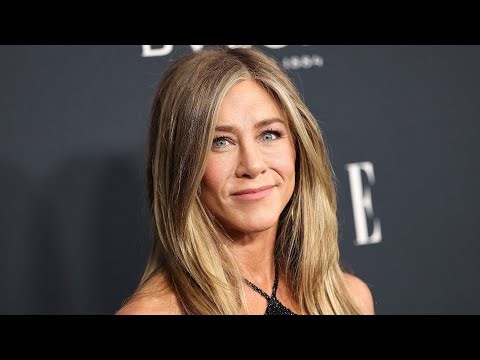 Why Jennifer Aniston Says Her Signature Hair Is "Fake" | E! News