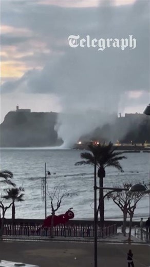 Waterspout hurls debris into air on Spanish coast