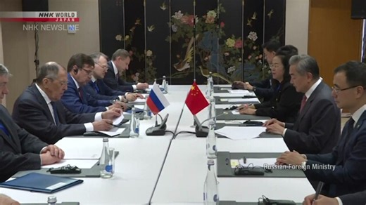 中俄外长会谈 王毅称绝不允许日本重新武装