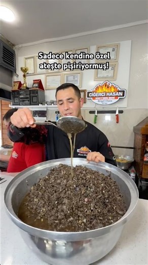 This chef's unique feature is that he cooks the roast over a wood fire. #food