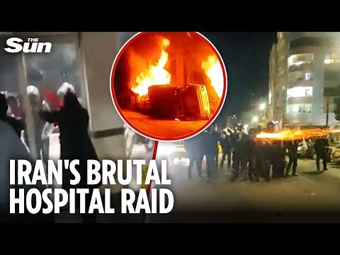 Horrifying moment Iranian security forces raid hospital and 'kidnap' people they shot in protests