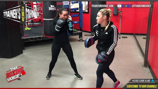 Heather Hardy teaching 'The Heat' to female boxer in training
