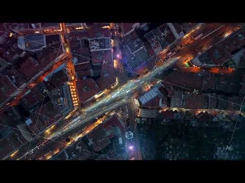 Connected autonomous cars navigating through illuminated city streets at night, advanced artificial