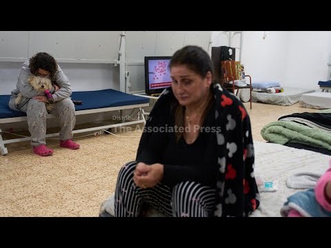 Residents of northern Israeli city are under fire from both Iran and Hezbollah, AP Explains