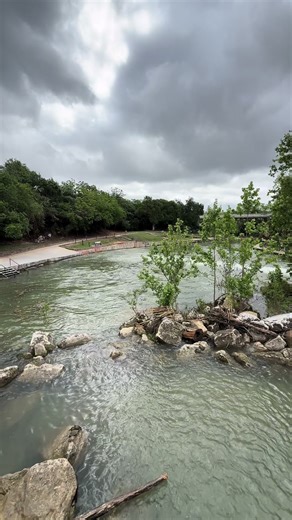 Just walking along the Comal River, crossed over the bridge, and stopped to look down into that clear spring water. Turtles everywhere — dozens of them chilling on rocks, logs, and the riverbed like it’s their own personal spa. Then I glance over to the right… and there’s a whole crew of firefighters suited up, getting ready for water rescue training right there in the river. Ropes, gear, the works. Only in Texas do you stumble into a scene like this on a random walk. Come down to the Comal, bri