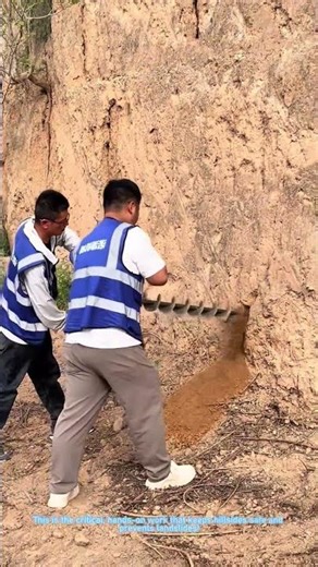 Slope Stabilization Work: Drilling Holes with a Gas-Powered Auger