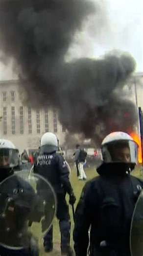Protesters clash with police over planned government cuts in Belgium