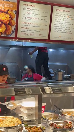 DISGUSTING Moment Panda Express Employee Stands on Counter, Sprays Chemicals Over Food #shorts