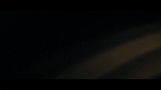 Set against the silent, vast expanse of deep space, the title sequence of Alien (1979) slowly reveals abstract white line fragments that gradually align across the screen to spell out ALIEN.
