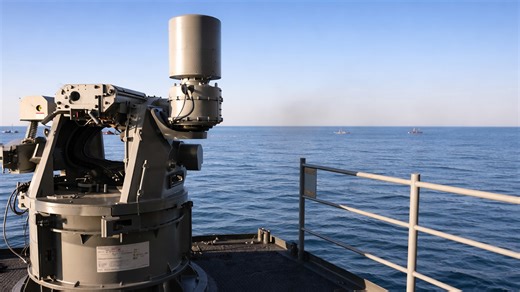 US Navy ship practices combat training with live fire