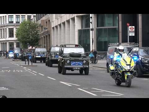 King Charles, British Army artillery and the Royal Family escorted by police