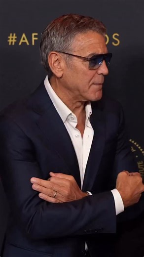 A Hollywood reunion we love to see 🤩 George Clooney and Nick Offerman were spotted chatting and laughing on the carpet as they reunited at the AFI Awards Luncheon, proving great on-screen connections make for even better off-screen moments 🤝 | HELLO!