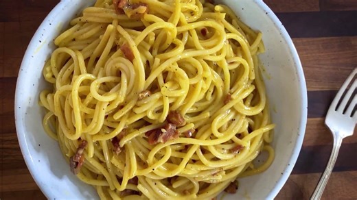 Smoked gouda adds extra creaminess to this spin on a classic carbonara, and pairs perfectly with chunks of thick cut bacon. GET THE RECIPE: bit.ly/3Q8s1EM | Food & Wine