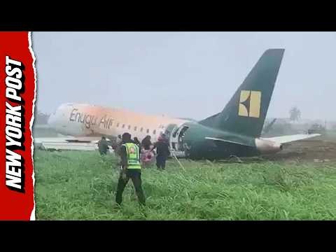 Moment Stunned Passengers Evacuate After Nigerian Plane Crashes Into Bush