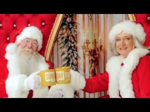 Santa and Mrs. Claus Toast to 2026 in Sunday Mug Shot