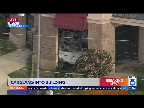Vehicle crashes into Temple City building; 1 trapped