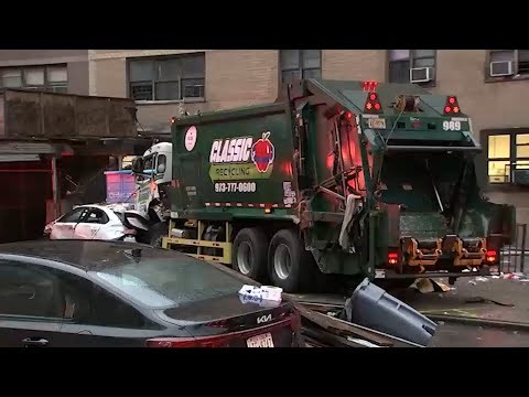 Woman killed when private garbage truck pushes car into scaffolding in East Harlem