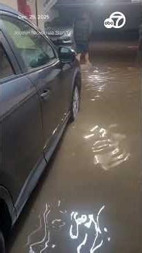 Floodwaters engulf homes as severe storms slam California