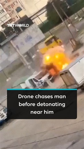 Drone chases man before detonating near him in Ukraine