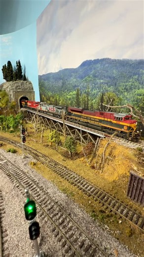 Andrew Barlow — Train Photos/Videos on Instagram: "KCS4164 SD70ACe got a chance to lead on a “Tuesday trains” manifest at APN leading a 4x1 motive power consist on a modern CPKC train. These clips include a LTEX engine rebuild shop scene as well as front & rear shots of the train so all of the units can be seen. 🎥 12/23/25 #hoscale #modeltrains #cpkc #kcs #canadianpacific"