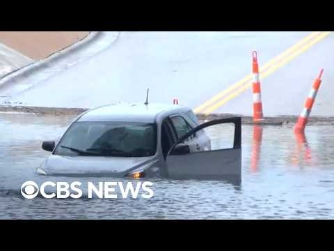 Flooding debris lines curbs in Indiana as rain keeps falling
