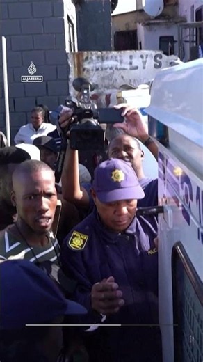 Tense standoff at an anti-migrant protest in a South African town | AJ #shorts