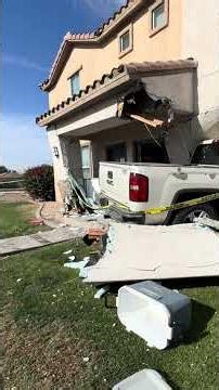 Two families displaced after truck drives into townhomes