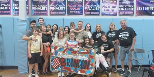 Siouxland Army National Guard sergeant surprises children with heartwarming homecoming