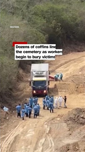 Workers bury unidentified victims of Venezuelan earthquakes