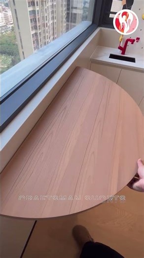 Small folding table installed on the wall