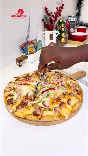 Fully Loaded Chicken Pizza ✅INGREDIENTS PIZZA DOUGH 1 1/2 (180g)cup bread or hard flour 1 tablespoon sugar 1/2 teaspoon salt 1 tablespoon active yeast 1 tablespoon oil 1 cup water 1/2 cup hard flour for kneading ✅PIZZA TOPPING Chicken breast (onga chicken powder,paprika,black pepper,garlic powder Stew Tomato ketchup Red bell pepper Green bell pepper Yellow bell pepper Onions Mozzarella cheese ✅NOTE You can use any topping of choice Example(chicken,beef,veggies etc) You can buy pizza sauce or use