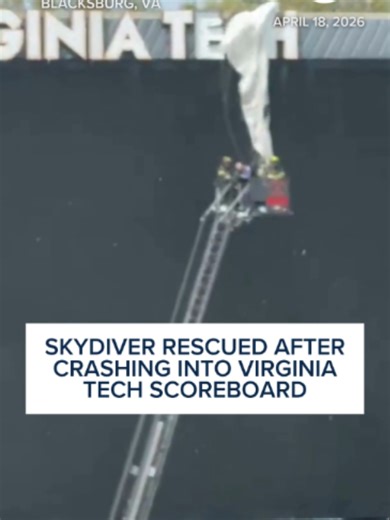 Kickoff for Virginia Tech’s 2026 Spring Football Game was delayed by more than an hour after a parachutist crashed into the scoreboard at Blacksburg’s Lane Stadium on Saturday, April 18. The parachutist, who was part of a team of three skydivers, was rescued within 15 minutes and was deemed by a medical team on site to have no serious injuries. Read the story at our link above. #skydiver #gonewrong #virginiatech #crash #fyp #news