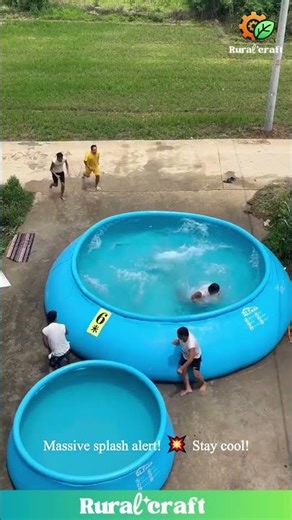 10,000 Gallons of Fun in One Giant Inflatable Pool! 💦 Watch These Guys Take the Ultimate Dive!