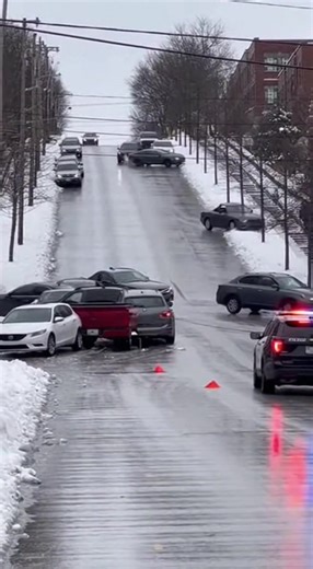Car Loses Control on Icy Hill and Slams Into Vehicles at Bottom Pittsburgh, PA — A routine winter drive turned destructive when a car lost traction on an ice-covered hill and slid uncontrollably downhill, crashing into multiple vehicles stopped at the bottom as drivers watched helplessly. Footage from the scene shows the car drifting sideways as it descends, tires locked and spinning uselessly on the frozen pavement. Despite attempts to steer, the vehicle continues accelerating downhill, unable 