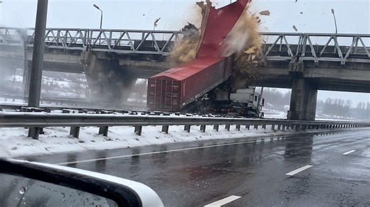 Watch This Truck Collide With an Overpass and Get Completely Destroyed