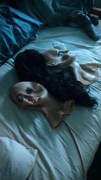 Two pretty female masks for one rubber doll to wear!