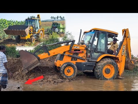 JCB 3DX Plus Pulling out Harvester Stuck in Mud and Pipeline dig of Canal water to Old Farmer Well