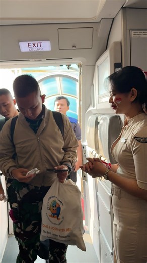 Did you notice the passenger in uniform?