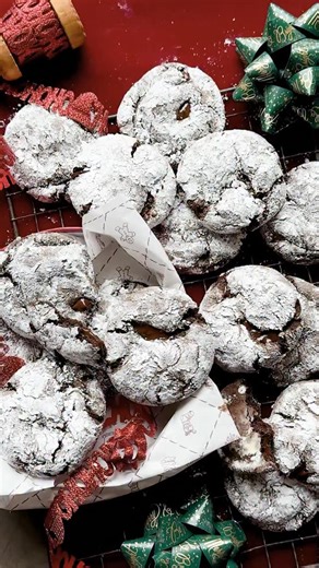 Tieghan Gerard on Instagram: "Gooey Chocolate Crinkle Cookies. Rich, fudgy, and irresistibly gooey, they taste almost like a lava cookie in crinkle form. When eaten warm, the chocolate melts through the soft centers, making them completely delicious. The perfect easy Christmas cookie! 🎄🤶 Comment HBH to get the recipe sent to you! https://www.halfbakedharvest.com/chocolate-crinkle-cookies/"