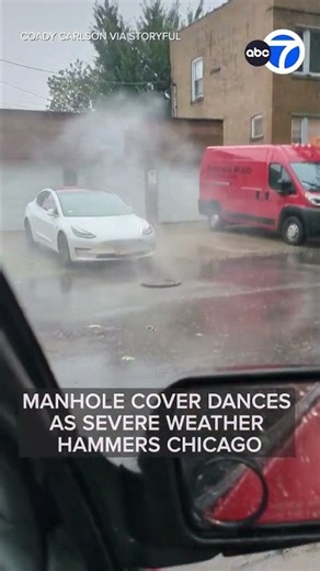 Manhole cover dances as severe weather hammers Chicago