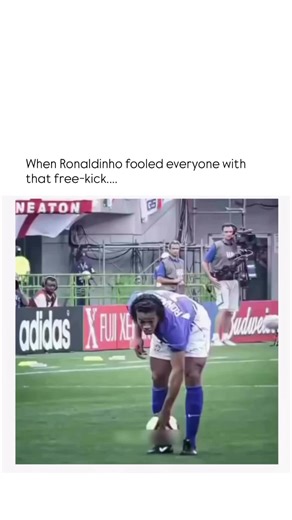 2026 on Instagram: "Ronaldinho’s iconic free-kick against England in the 2002 World Cup quarter-final is widely regarded as one of the most magical moments in football history. Taking a free-kick from approximately 35 yards out on the right touchline, Ronaldinho curled the ball over the head of England goalkeeper David Seaman, who had stepped forward, leaving the net exposed. The goal, which came just after halftime, proved decisive in Brazil’s 2-1 victory and propelled them to their fifth World
