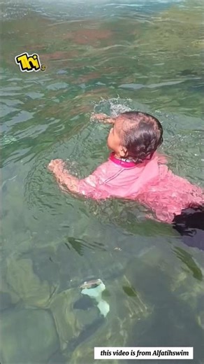 Swimming in Clothes? This Kid Knows Survival Skills!