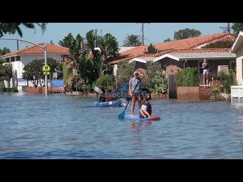 Residents in California use kayaks, paddleboards to navigate flooding from Tropical Storm Rachel