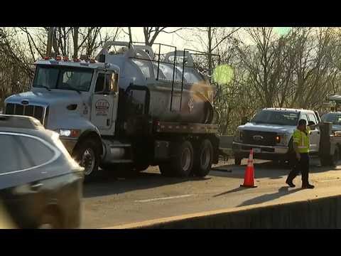 Tanker truck hauling milk overturns on I-40, prompting hazmat response
