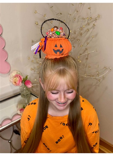 Trick or treat! Jack-o’-lantern hairstyle! 🎃👻🧡 Now for the big question…are you grabbing the 🍬 sweet treats or 🍿 savory treats this Halloween? 🥨 🍫 No tricks, just treats over here! 🤭 #halloweenbeautytiktokcontest #hairstyle #hairtutorial #braids #hairtok Halloween hairstyle ideas, styles for hair