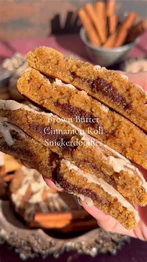 Snickerdoodle Cookies are a classic cookie, but I’ve upgraded them by stuffing them with my cinnamon roll filling and adding a luscious vanilla glaze. Soft brown butter snickerdoodles are stuffed with my cinnamon roll filling and baked to chewy, crisp-edged perfection. Top the warm cookies with a drizzle of vanilla glaze – these taste exactly like a cinnamon roll combined with a snickerdoodle cookie! #snickerdoodles #cookies #bakingszn #cookierecipe #cinnamonroll