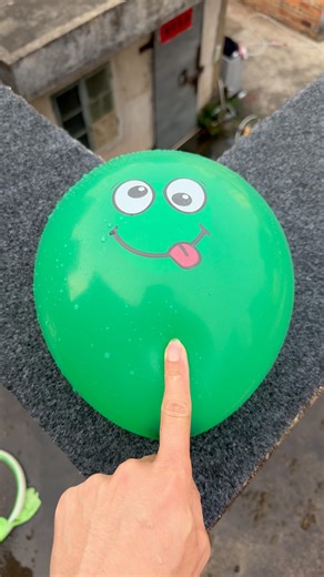 Experiment: Will a water balloon explode if it rolls down a tall building? 💥🎈 #balloon
