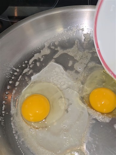 Two Fried Eggs on Stainless Steel: Perfect Breakfast Sandwiches