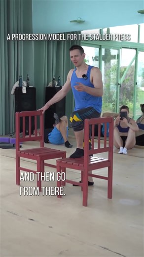 A progression model for the stalder press to handstand