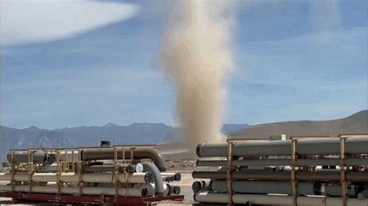 Immense dust devil dwarfs mountains in northern Nevada